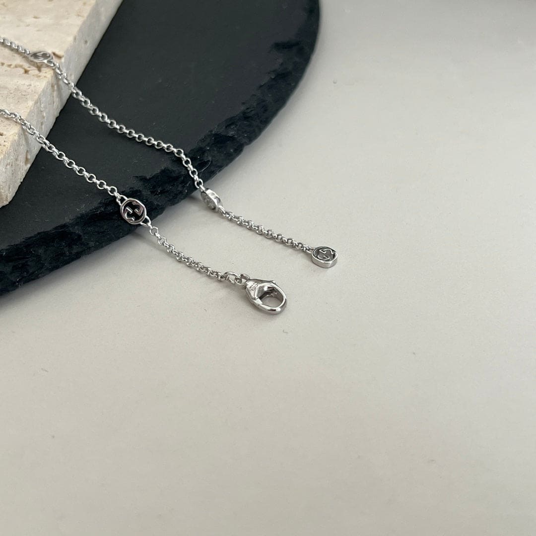Double Gucci Interlocking Gucci Heart Lightning Charm Necklace