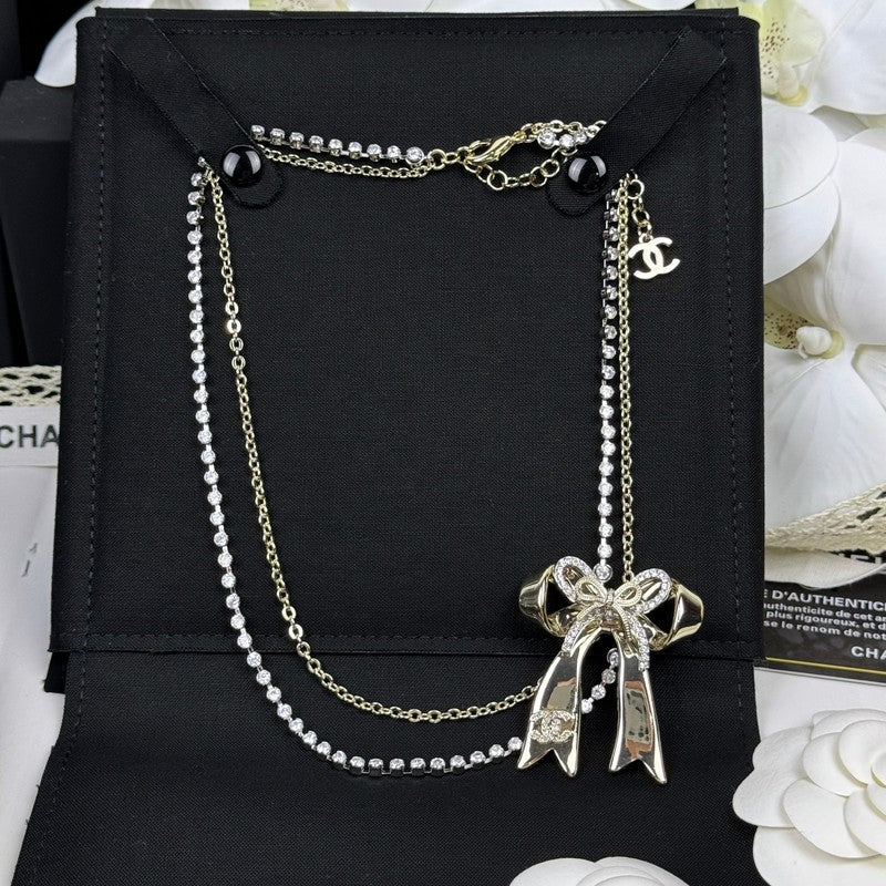 18K  Chanel 25K Bow Tie Diamond Gold Necklace