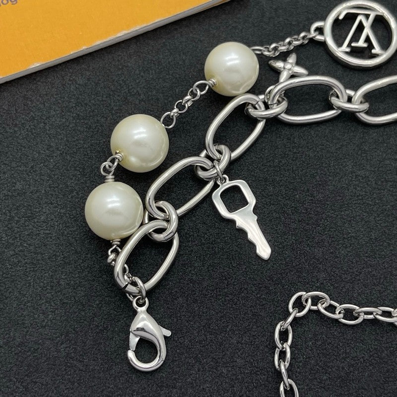 18K Louis Vuitton Pearl Lock Gold Bracelet