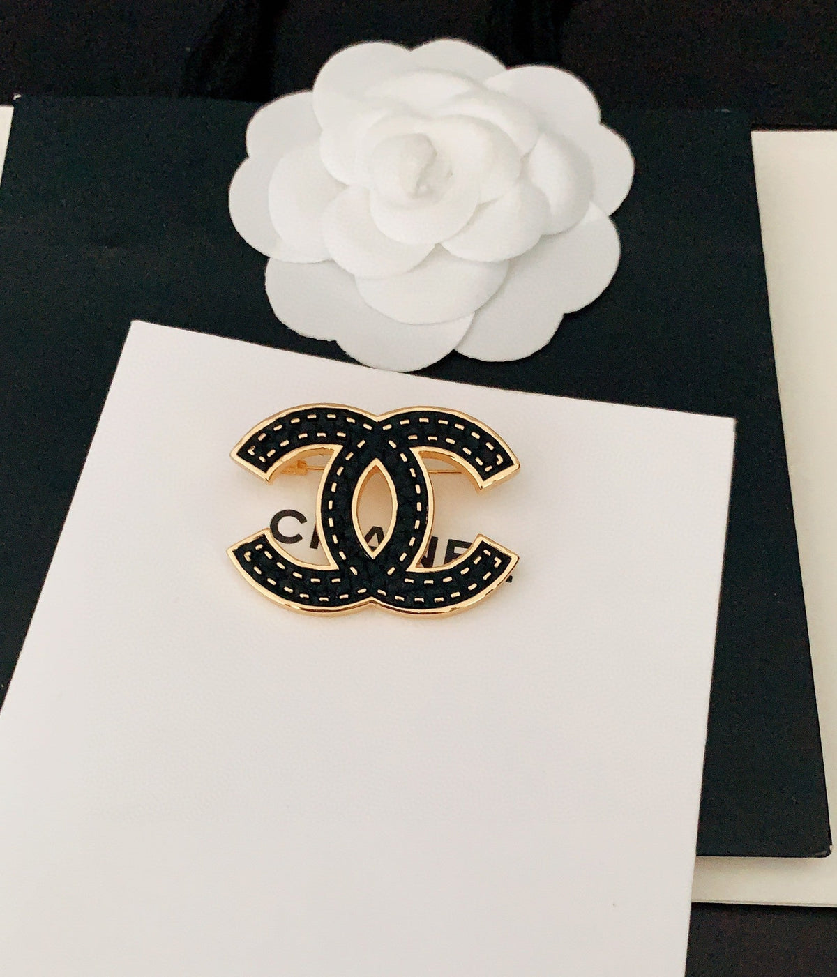 18K  Chanel Black Brooch