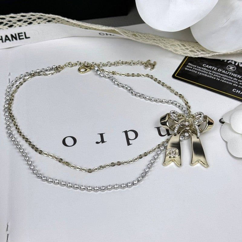 18K  Chanel 25K Bow Tie Diamond Gold Necklace